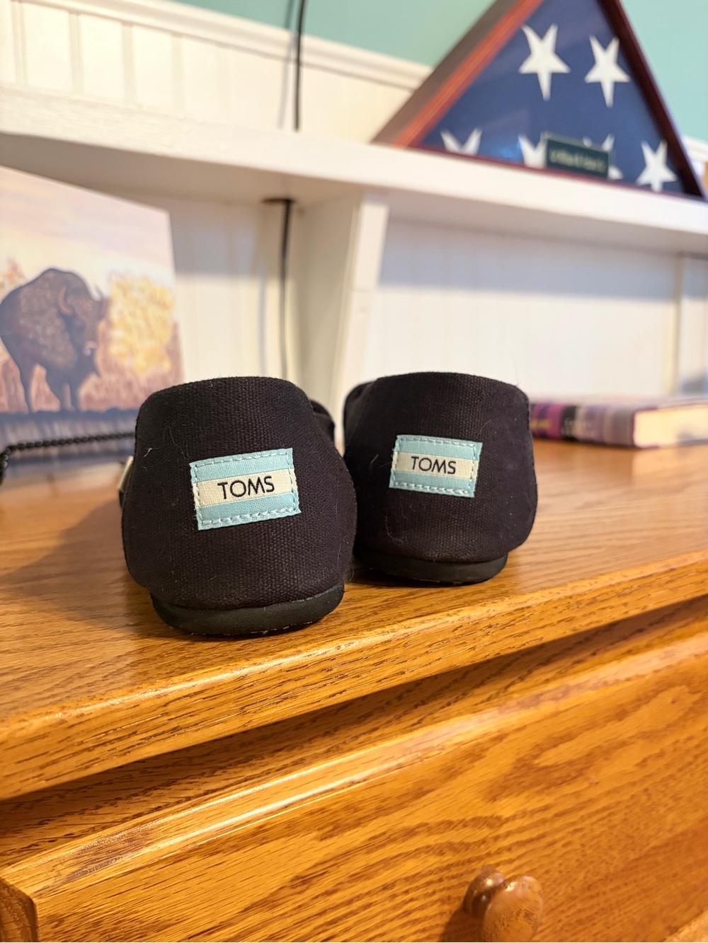Toms Black Canvas Slip-Ons with Light Blue Heel Tabs